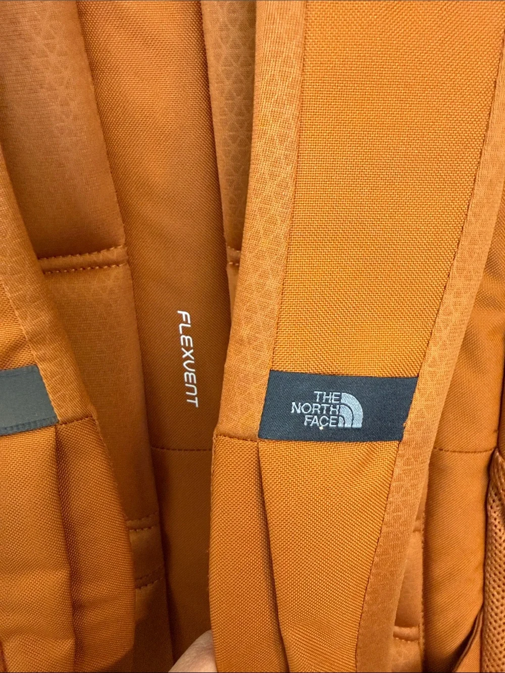 North Face Jester Backpack in burnt orange & black accents Excellent Condition